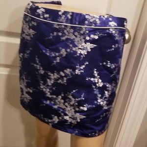 Blue satin embroidered mini skirt